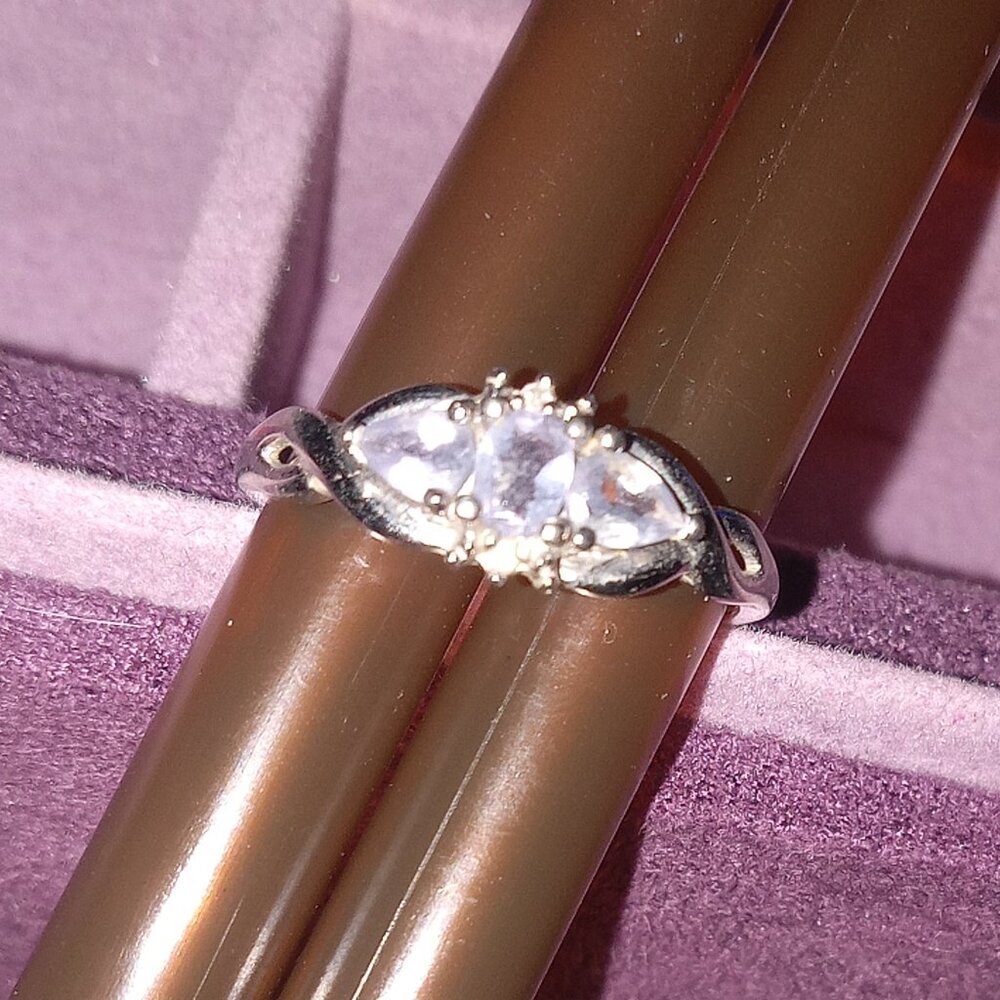 Silver ring with blue topaz stones